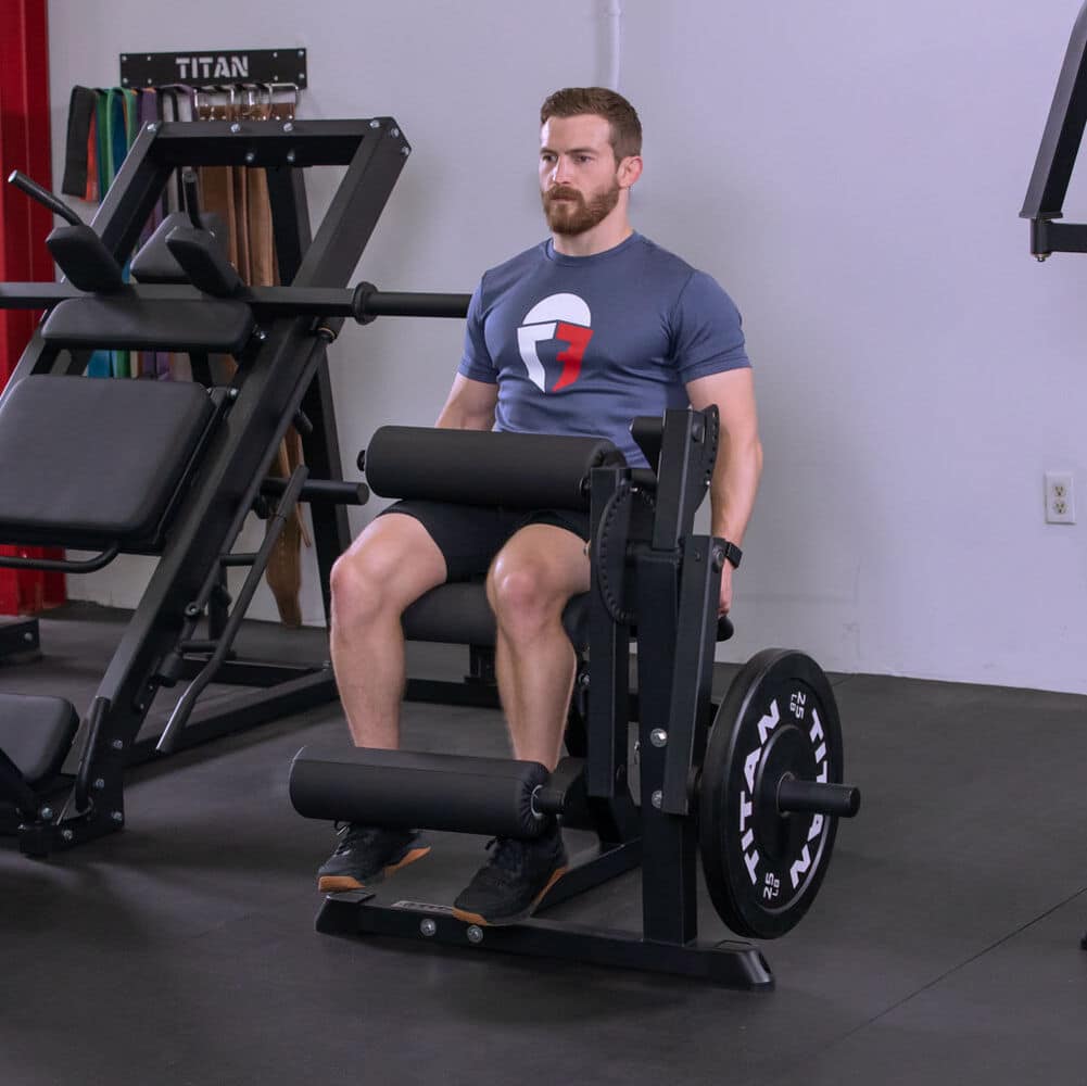 man performing seated leg curls