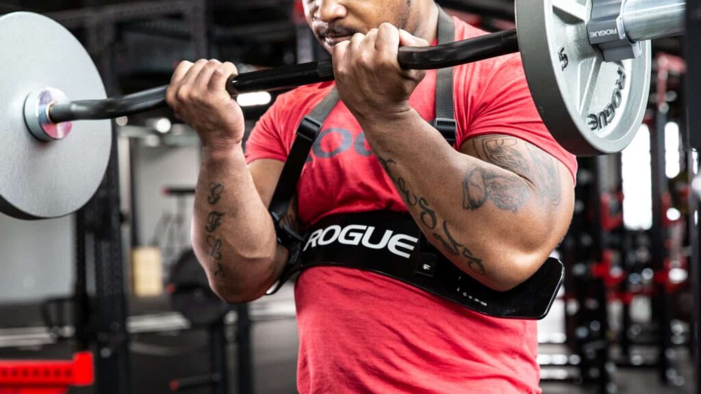 man curling with the rogue curl bar