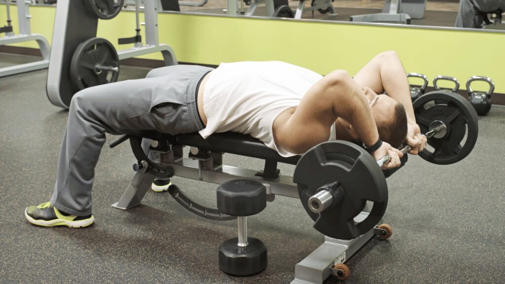man performing heavy skull crushers