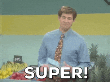 John Krasinski saying super in front of a bunch of fruit