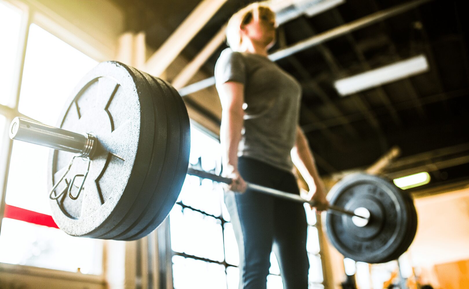woman performing a deadlift
