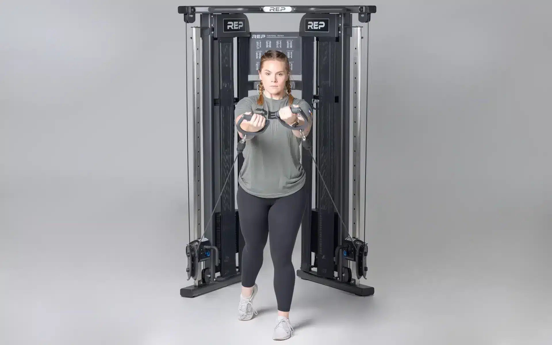 woman using the ft-3000 for low to high cable flyes