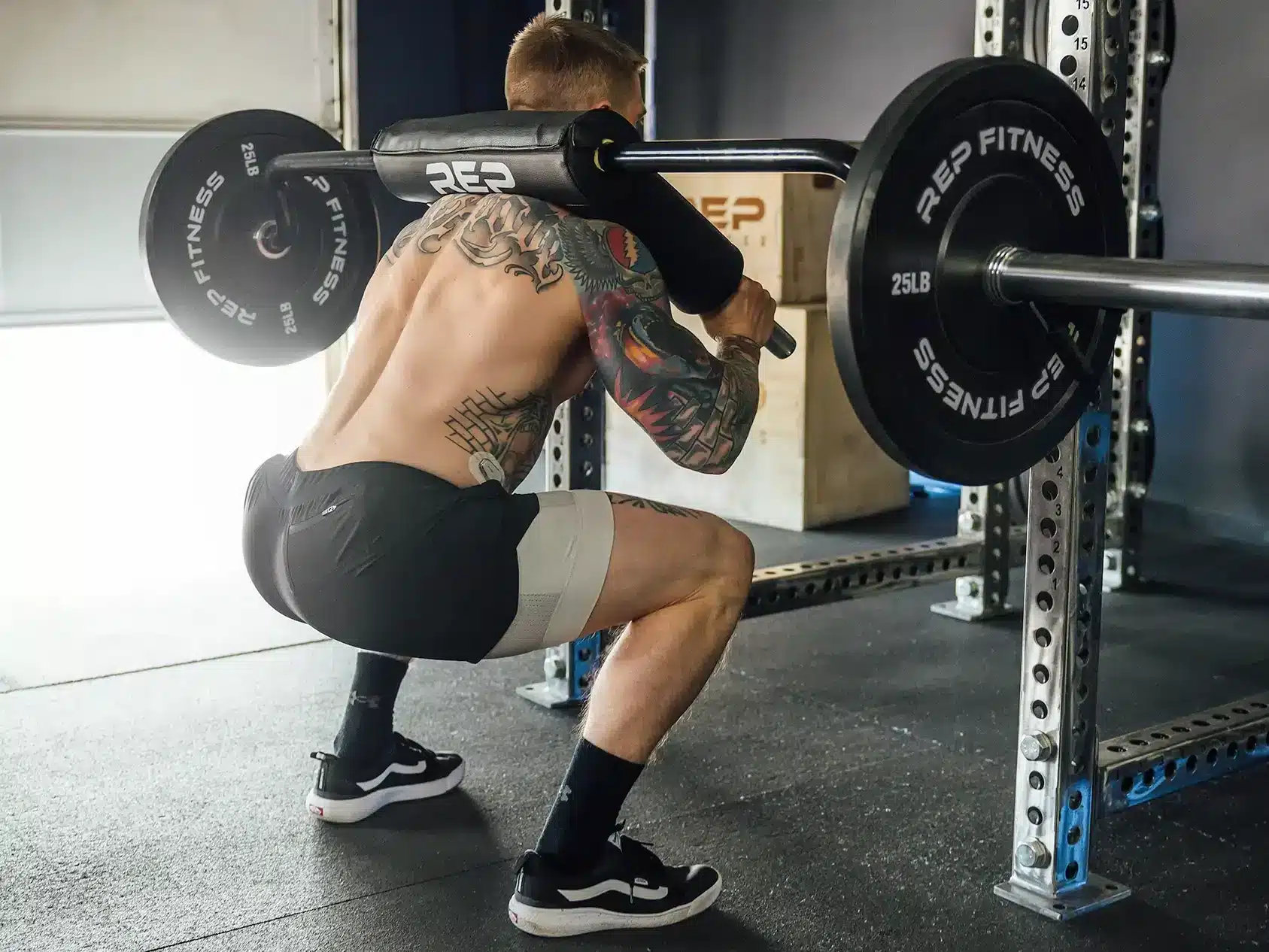 man safety bar squatting with rep ssb