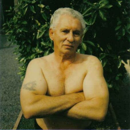 lewis g dymeck crossing his arms