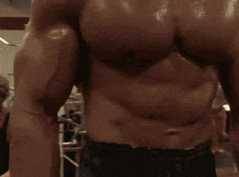 arnold doing a lat spread showing off his massive back